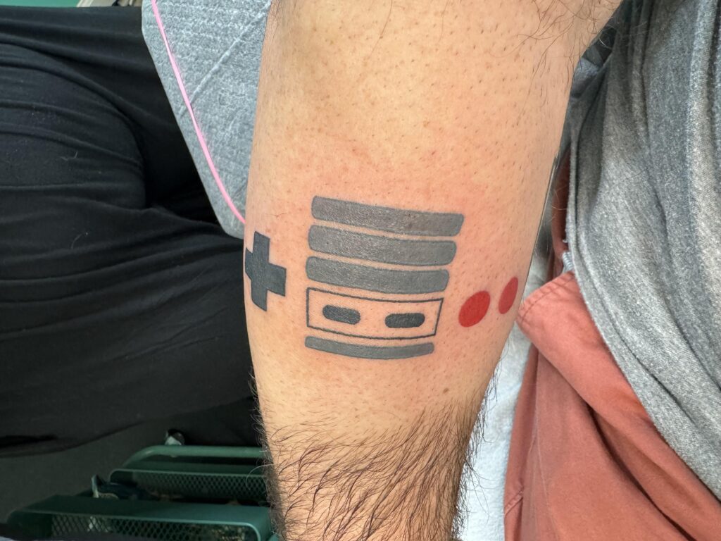 Minimalist NES tattoo I got a couple months back