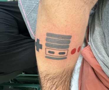 Minimalist NES tattoo I got a couple months back