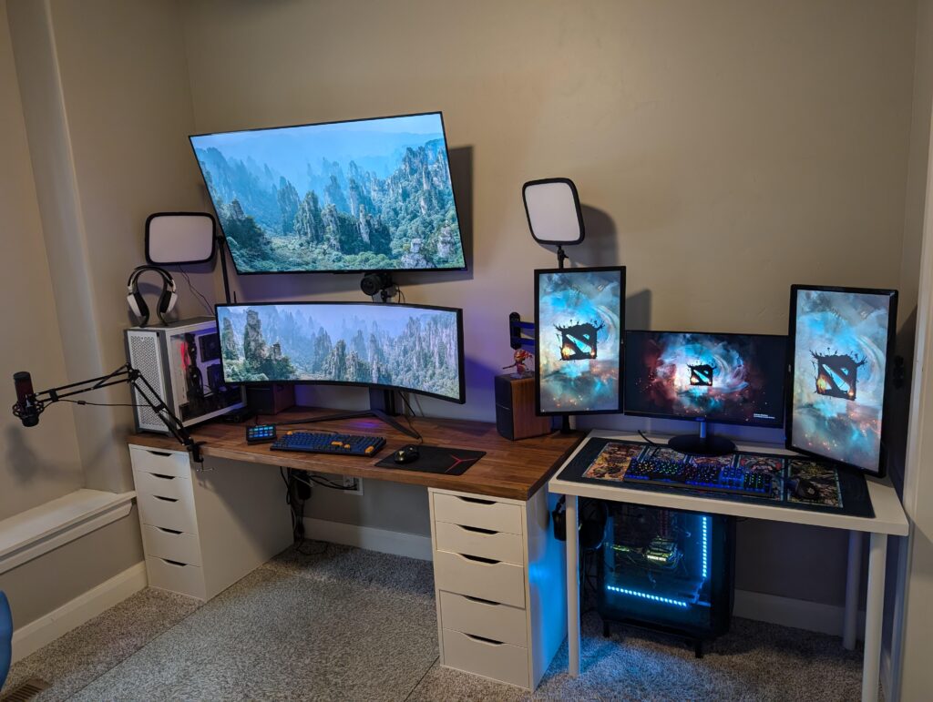 My 14 year old son and I's battlestations. Can you guess which is which?