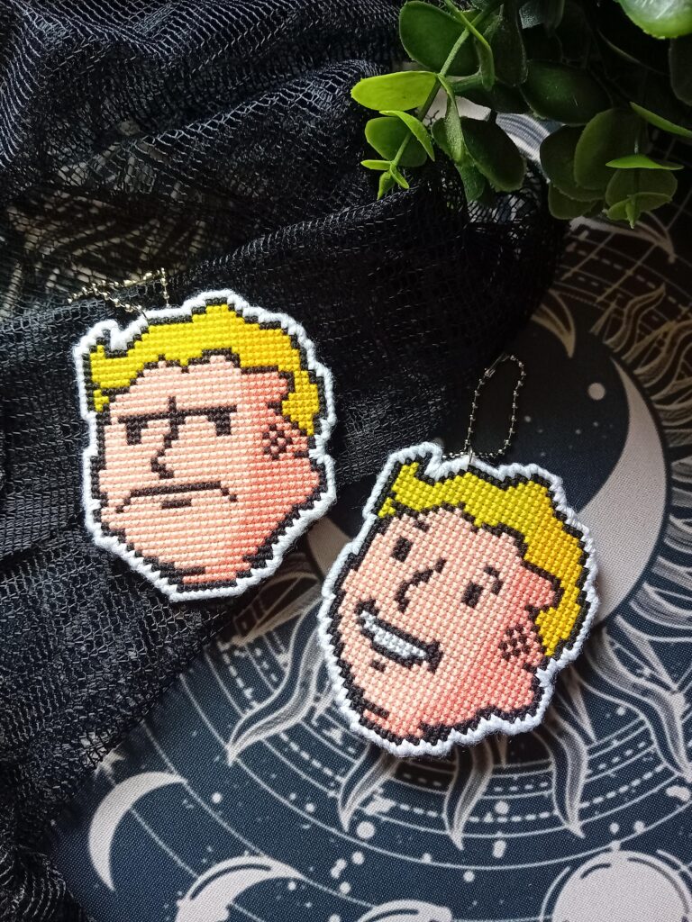 Stitched these Fallout Vault Boy keychains this week.