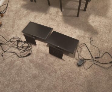 Found some free tech sitting on top of the dumpster and mounted one of the monitors in the most jank way possible
