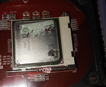 My Cousin's PC from 2003 and he asked me to help fix it. I can see why MB and CPU died.
