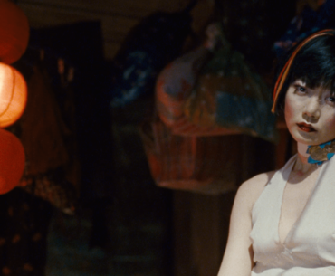 Screenshot from Cloud Atlas (2012) - Fabricant at the Night Market