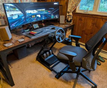 For the 5th time this week, my setup is done. Grabbed a mount for my wheel and pedals, pretty nice improvement over clamping it to the desk.