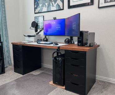 MacBook Pro for Work, PC for Gaming, sitting on an IKEA Desk