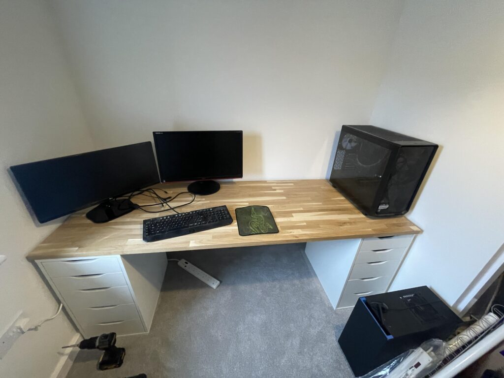 PC on top or below table?