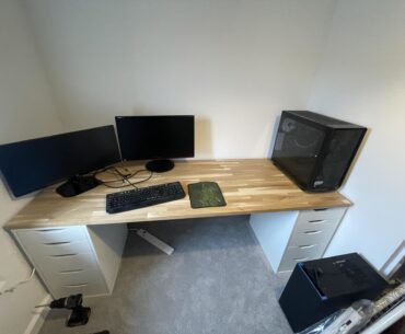 PC on top or below table?