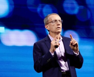 Intel Will Cut Over 15,000 Jobs Amid Struggles to Turn Itself Around, Pat Gelsinger seen preparing three envelopes.