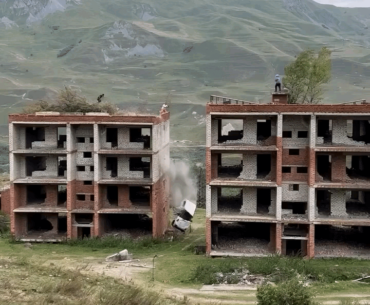 How did they get a car on top of apartments?