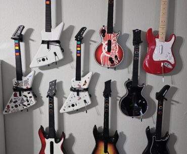 Wall mounted my Guitar Hero/Rockband guitars.