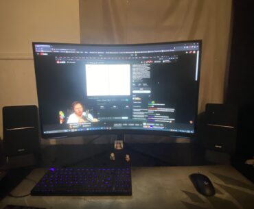 Second vertical monitor or single with speakers?