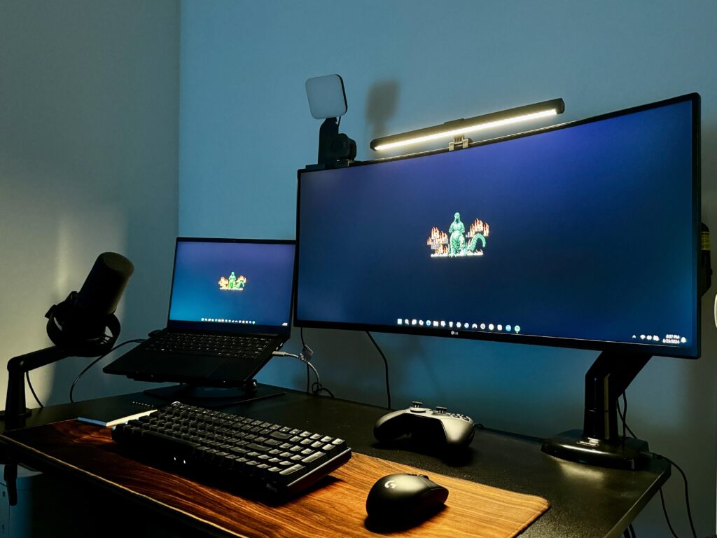 space saving reversed black and walnut battlestation