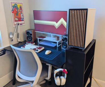 New apartment, improved setup. Still working on the wall decor (I'm not fully unpacked yet).