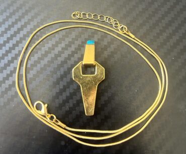 My parents know how big of a cyberpunk fan i am so they surprised me with this necklace!