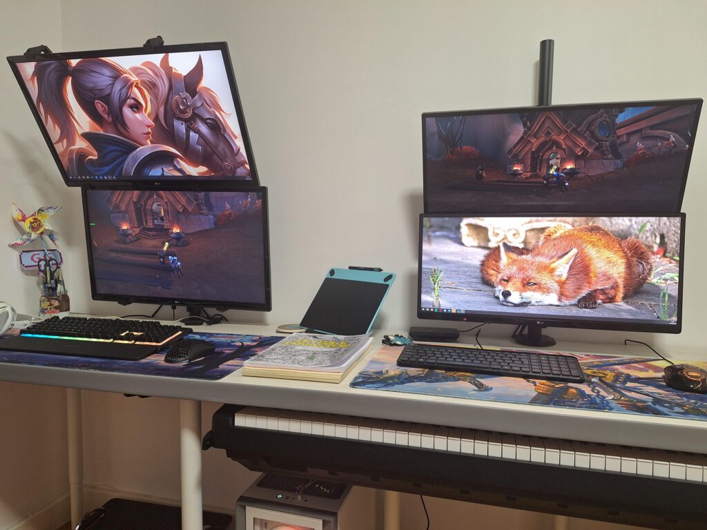 Painting, music and gaming couple’s battlestation Painting, music and gaming couple's battlestation