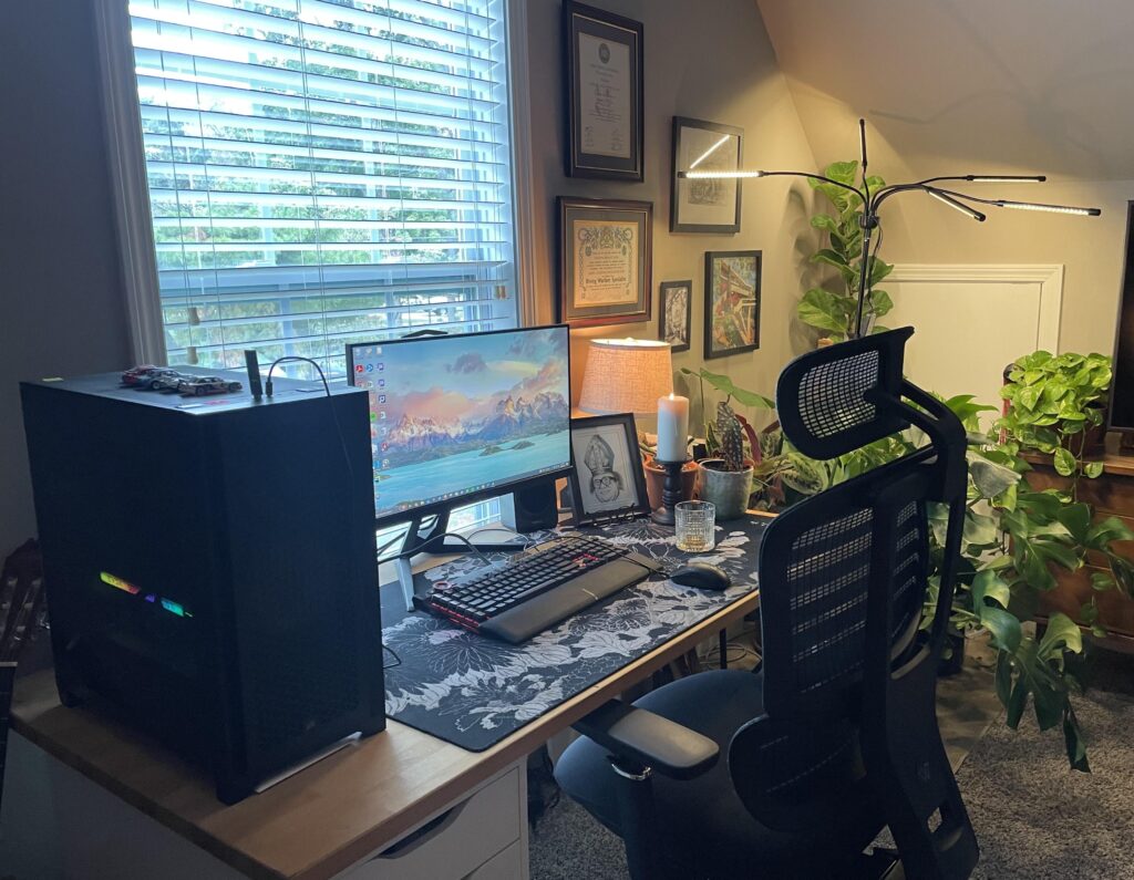 Recently moved into a studio above a garage. Finally a little proud of my setup. Roast away.