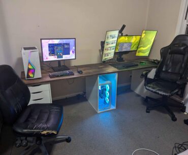 New setup-Had my Gf move in and built a new computer and upgraded my desk gave her my old Computer. The chairs need an upgrade and some leds would not hurt what do you guys think?