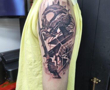 Got the death tarot tattooed with some artistic flair from the artist