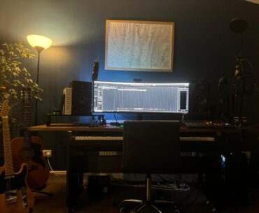 My new space - 45 year old Father of three, relegated to a corner of the living room. Trying to keep it as minimal as possible. Tomorrows mission is to hide all the wires you can see beneath the desk!