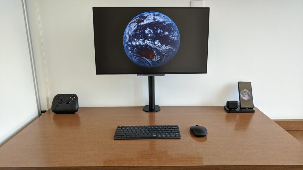 Small table, clean setup. Running on a Surface Pro 9 mounted under the table, witha JBL flip 6 mounted behind the monitor for sound.