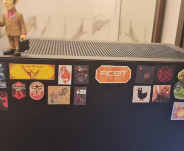 I see your stickers on laptops, I raise you magnets on dekstops.