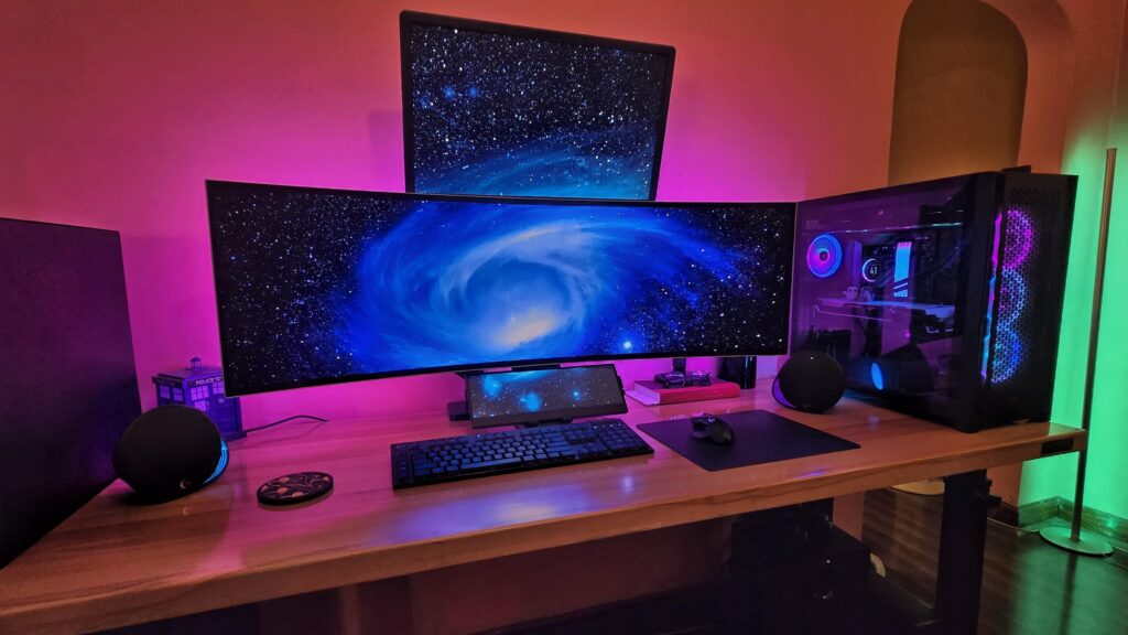 added another monitor and some Logitech gear.