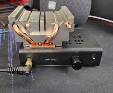 My God, it actually worked. Old nameless cooler from my closet on Schiit Magni.