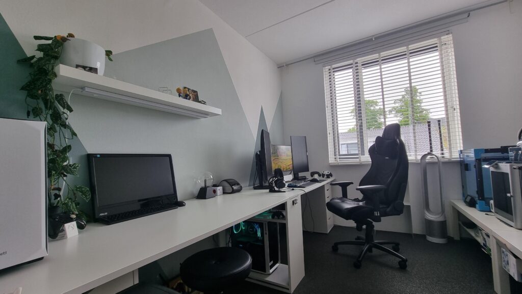 My during the day setup whole room angle. Left is a work pc for the wife.