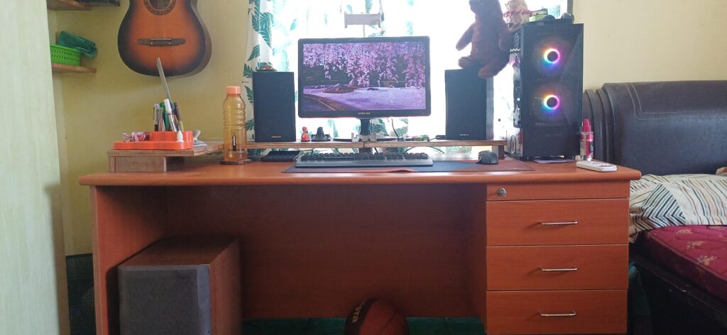 Somewhat messy, and a WIP, but this is mine! New monitor to come, along with some laminate for my diy monitor stand thing