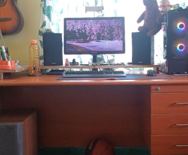 Somewhat messy, and a WIP, but this is mine! New monitor to come, along with some laminate for my diy monitor stand thing