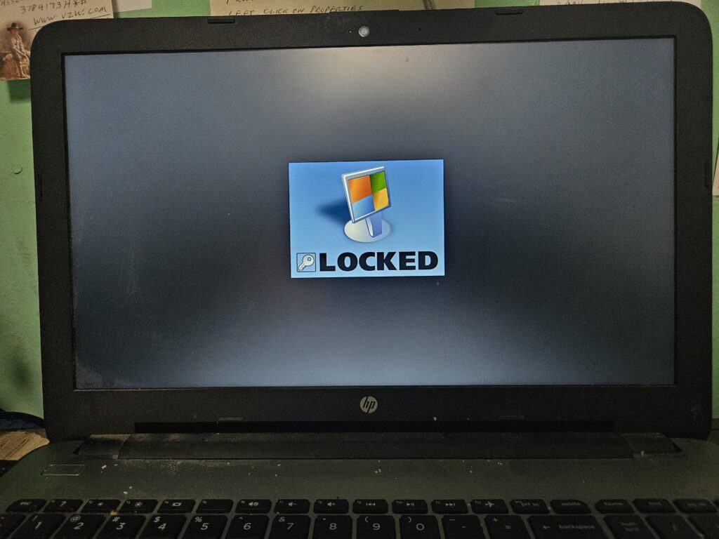 Scammers locked elderly fathers pc, anyone know a solution to get back in?