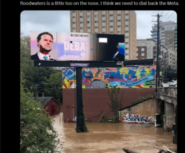Digital billboard struggling during a flood.