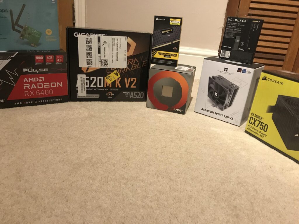 The components for my first PC (it’s very budget) (I forgot include the case in the photo)