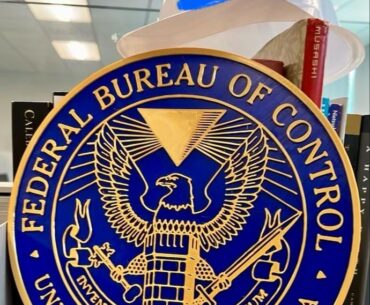 I work for the federal government and my coworkers always ask why I have another agency’s crest at my desk.