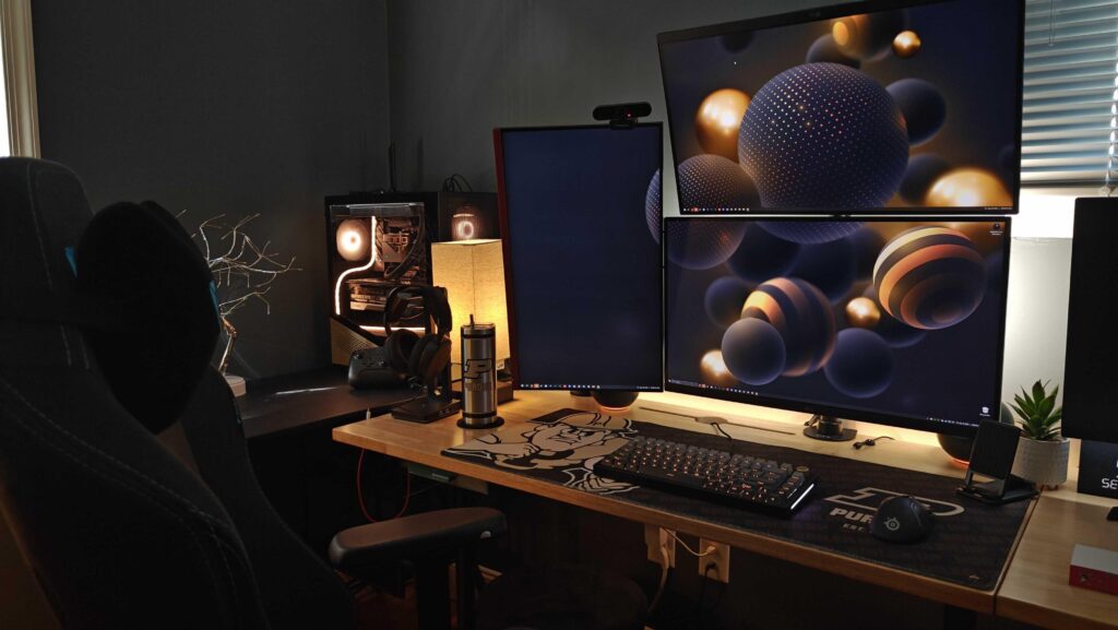 Made a lot of changes in the last few years and pretty happy where it's at now, definitely can't go back from the 3 monitor life. Also, I love Purdue!
