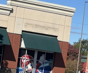This GameStop never took off its Super Mario Galaxy decoration for the window from 2007, even after it closed down this year it still remains