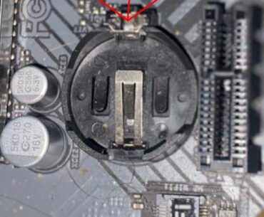 Why are certain board vendors fitting a rubber piece in the CMOS socket to prevent users from removing CMOS battery? ASUS does this as well but they use an easily removable non-glued on piece. ASROCK uses a just big enough rubber piece with an adhesive layer. Nearly broke socket to get that thing of