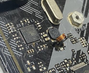 Capacitor snapped while cleaning. Is there a way to safely solder it back on?