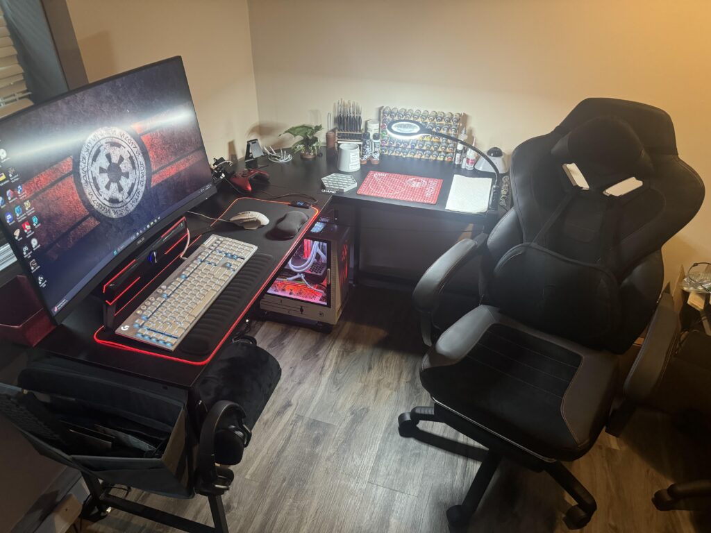 Not as impressive as some but this is my hybrid warhammer painting/gaming desk