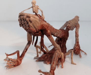 Coworker said he wanted a figurine of the one reborn from Bloodborne for his RP sessions. I 3D printed and painted this. I'll surprise him with it tomorrow