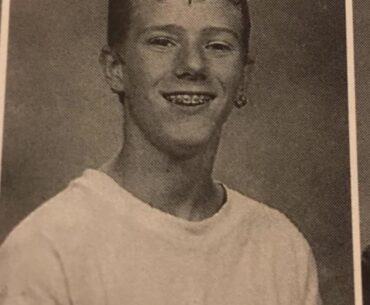 A young linus with braces: