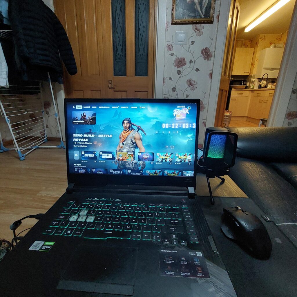 my old setup I had for 3 years, the sofa was caved in and split and I had to bend really far to use it. Nasty ass mousepad too.