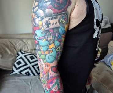 My gaming themed patchwork sleeve tattoo