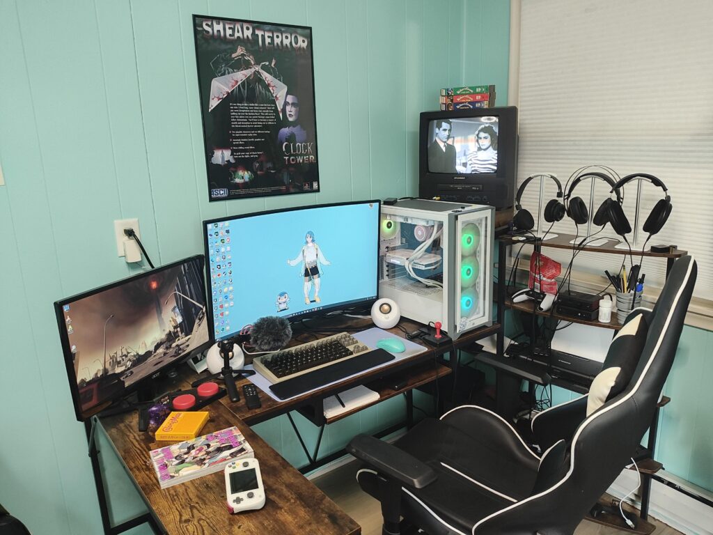 Little too dusty, little too messy, but its mine! And yes, the TV in the corner is hooked up as a third monitor.