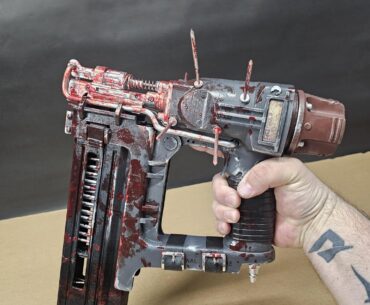 I made the "Puncture Wound" nailgun blueprint. 3d printed replica with removable magazine and magnetic nails for easy attachment & removal. See last pic for in game reference. ⚠️Fake blood⚠️