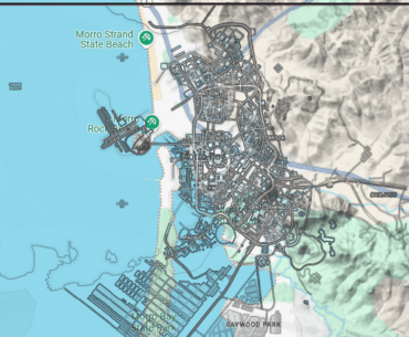 Night city map overlayed on a real-life map
