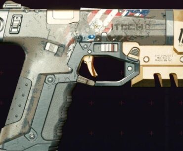 Why was V's pistol design changed?