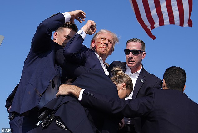 Menendez also faked his own death in the game, according to Military.com. Although Trump has not faked his own death, he did have a near death experience in Butler, Pennsylvania