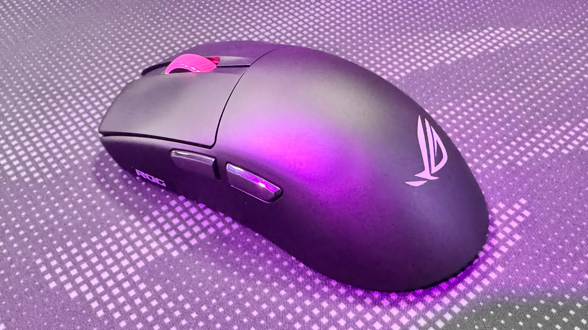 Asus ROG Harpe II Ace gaming mouse on a mousepad at Computex 2025.