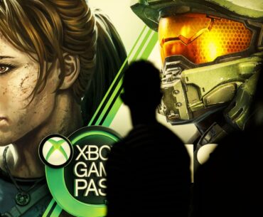 Attendees walk past Microsoft Corp. Xbox Game Pass signage